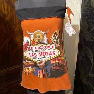 One of a kind handmade shirt to skirt. Adorned with Las Vegas logo.